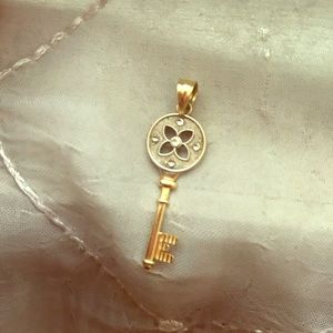 Gold and silver Key pendant